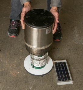 Wood gas stove with insulated pot. PV for fan on right.